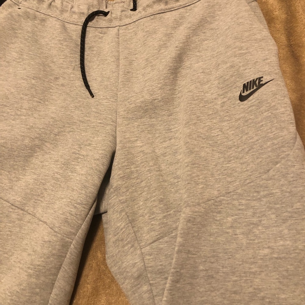 Gray Nike tech pants